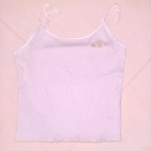 VS tank top with gold embroiled logo